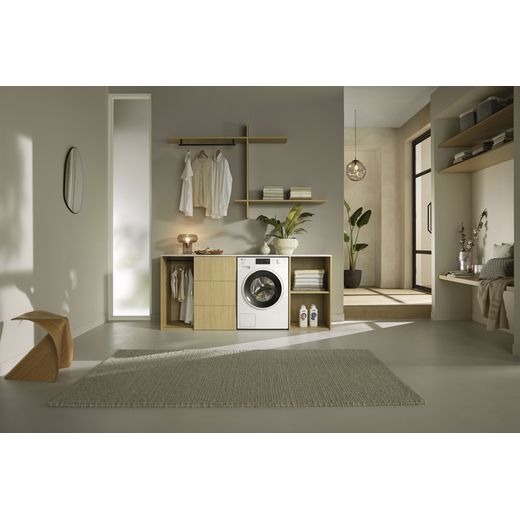 Miele W1 WSK363 WCS 10kg Washing Machine with 1400 rpm - White - Washing machine in utility room shot
